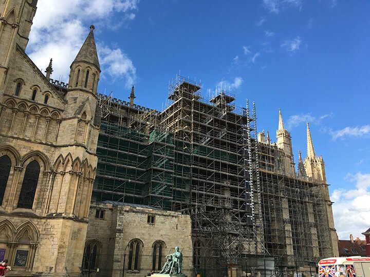 church covered with steel scaffolding