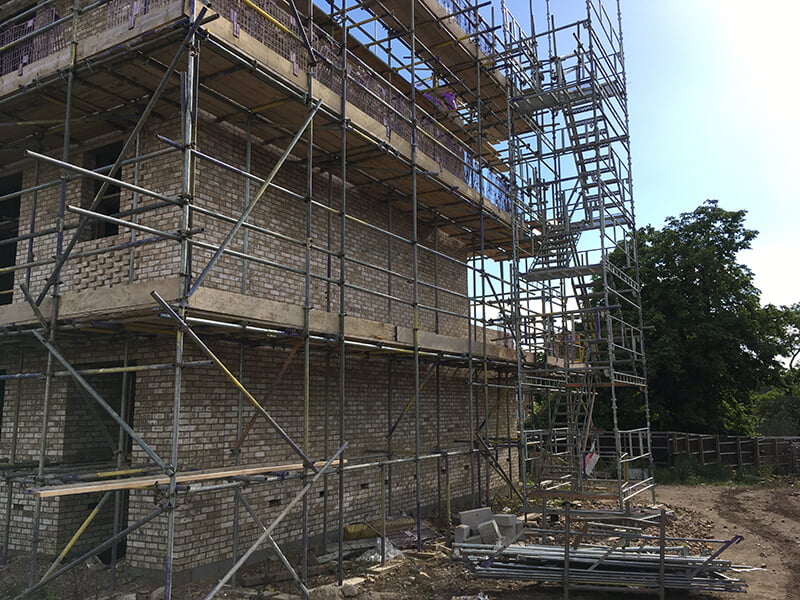 large scaffold in residential area