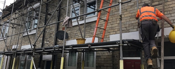 scaffolder climbing up the stairs