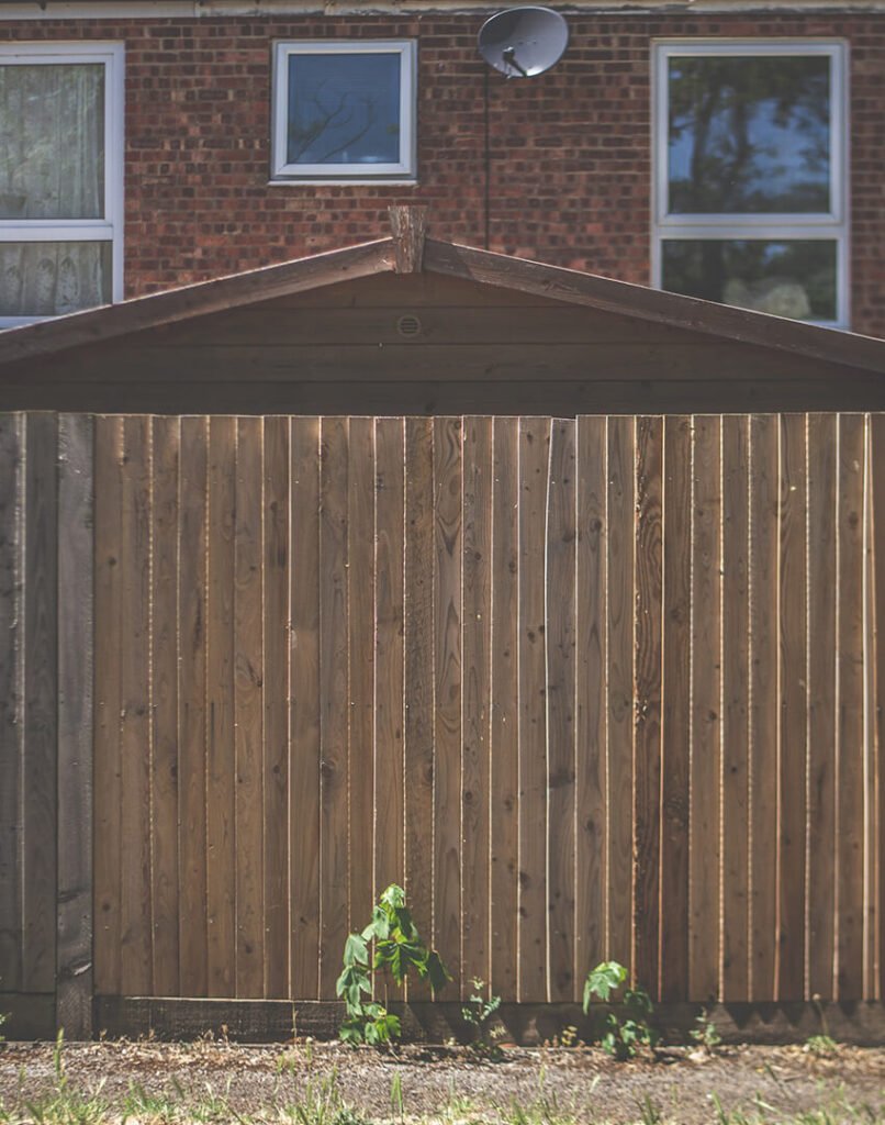 brown featheredge fence in England