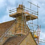 Chimney covered with scaffolding