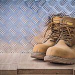 work boots on scaffold board