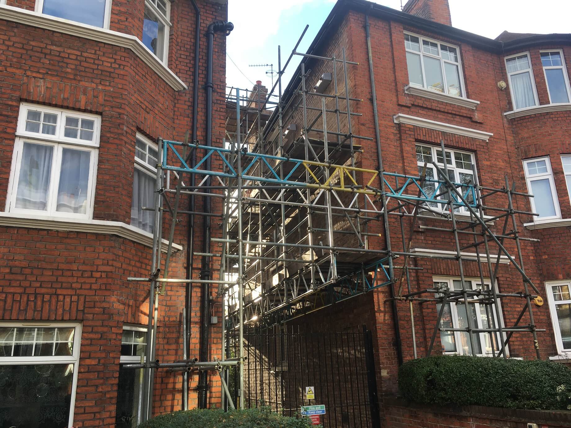 Chimney scaffolding on a n apartment roof