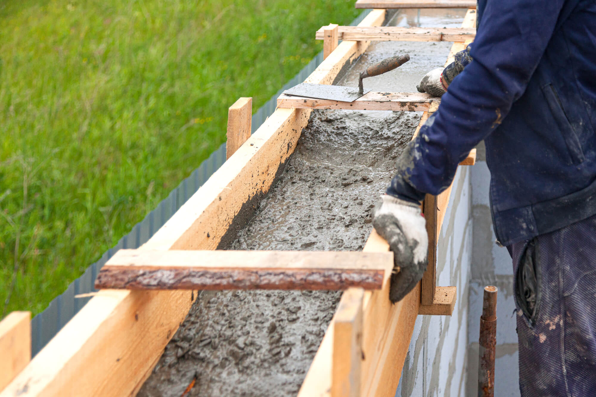 man installing a form work in a construction site